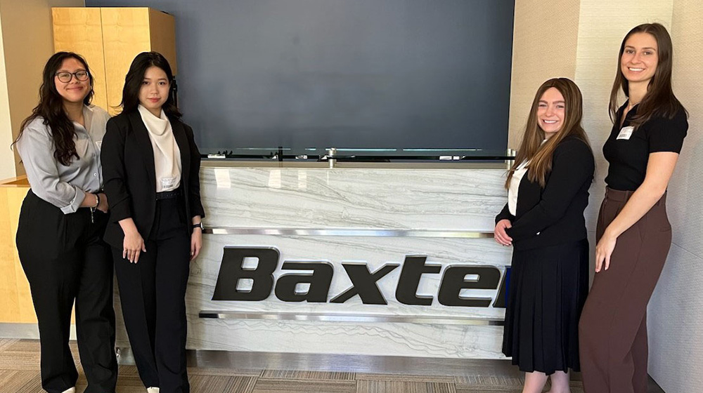 Biomedical engineering students after presenting their award winning capstone design project at Baxter Healthcare.