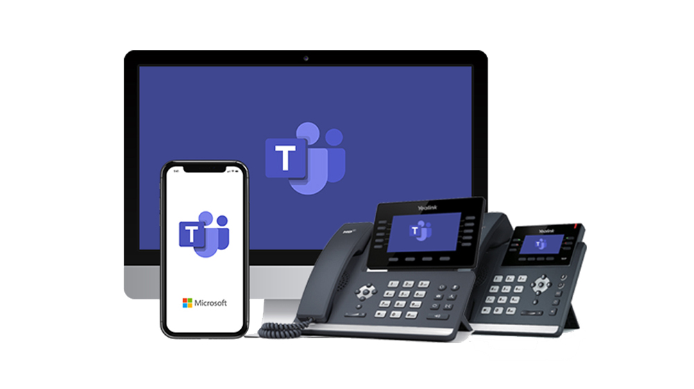 A computer monitor, mobile phone,and two Microsoft telephones with a purple Microsoft Teams logo on their respective displays.