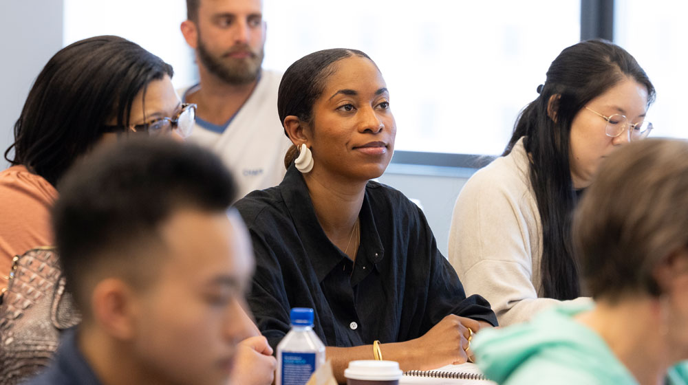 Students listening attentively during a classroom lecture
