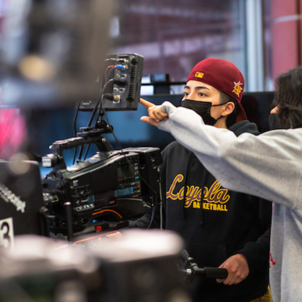 Loyola students recording at the School of Communication