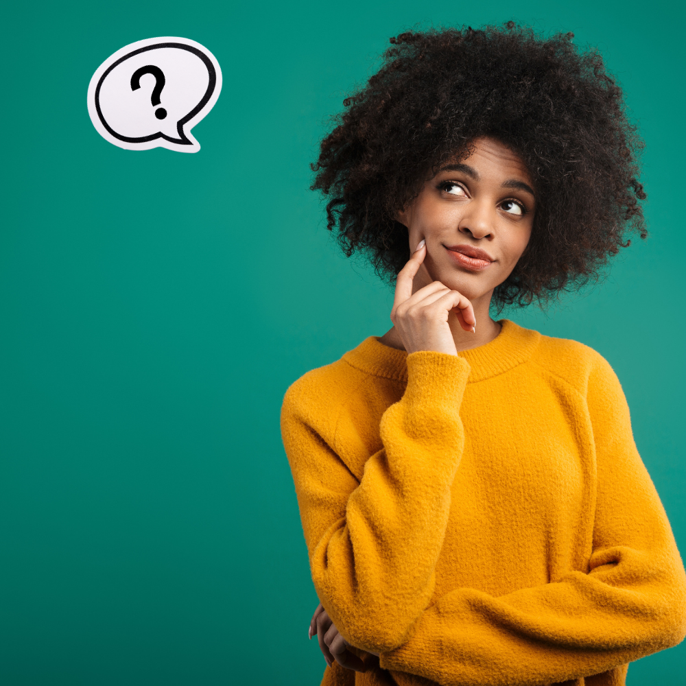 Person in a yellow sweater touching their chin thoughtfully, with a question mark icon beside them on a green background.